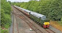  ?? PAUL HILL. ?? On its first loaded test run, preserved D213 Andania passes Madeley Junction (between Shifnal and Telford) with the 1242 Telford Central-Crewe test train. On the rear is 47805.