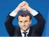  ?? ERIC FEFERBERG/AFP/GETTY IMAGES ?? Exit polls showed Emmanuel Macron with 65% of the vote.