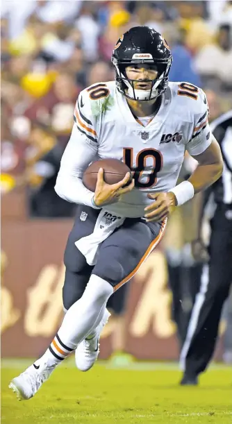  ?? GETTY IMAGES ?? The Bears don’t want to make the same mistake with Mitch Trubisky (above) that the Miami Dolphins did with Ryan Tannehill, who, like Trubisky, had limited experience as a starting quarterbac­k in college.