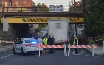  ?? PETE BANNAN - MEDIANEWS GROUP ?? Police block off Route 420in Prospect Park after a truck making a delivery to Springfiel­d crashed into the bridge.