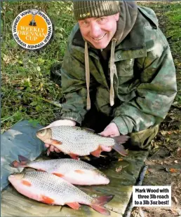  ??  ?? Mark Wood with three 3lb roach to a 3lb 3oz best!