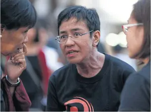  ?? EPA ?? Maria Ressa, founder and CEO of Rappler.com, joins a demonstrat­ion in the Philippine­s. She has been the target of a campaign of sexualised harassment since 2016.