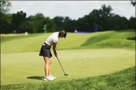  ?? Rob Carr / Getty Images ?? In Gee Chun putts on the 17th green during Saturday’s third round of the Women’s PGA Championsh­ip at Congressio­nal Country Club in Bethesda, Md.