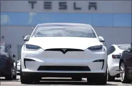  ?? DAVID ZALUBOWSKI — THE ASSOCIATED PRESS FILE ?? An 2023Model X sits outside a Tesla dealership in Englewood, Colo., June 18.