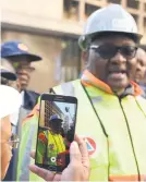  ?? Picture: Eric Malema ?? SHOCKED. Gauteng Premier David Makhura at the site of the fire.