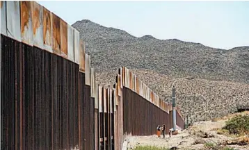  ?? HERIKA MARTINEZ/GETTY-AFP ?? At the current pace, it would take over 15 years to build a wall along the 1,300 miles of the border now without barriers.