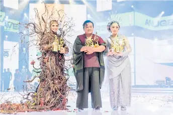  ?? — Picture by Shafwan Zaidon ?? Amir Jahari was crowned champion for his song ‘Hasrat’ while Aisha Retno (right) came in second and Aina Abdul won third place.