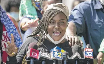 ?? ASHLEE REZIN GARCIA/SUN-TIMES ?? Miracle Boyd, 18, speaks Monday at a rally near East 51st Street and South King Drive. “I am not a menace, I am not a hood rat, I am not a rebel, but a dedicated freedom fighter,” she said.
