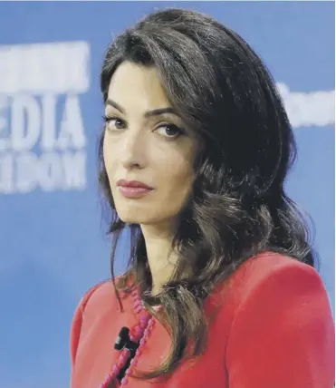  ??  ?? 0 Amal Clooney has written to Dominic Rabb