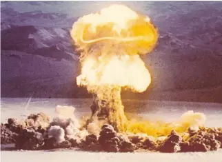  ?? PRODUCTION­S DE LA RUELLE ?? A nuclear bomb test of the 1950s in the Nevada desert: Age may dictate how we react to the perceived threat of nuclear war for baby boomers who grew up during the Cold War.