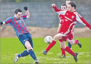  ?? PICTURE: PAUL TEARLE ?? Eoin Murphy, Dingle Bay Rovers, and Carndonogh FC’S Michael Toland vie for possession in their FAI Junior Cup last 32 match at Mounthawk Park, Tralee