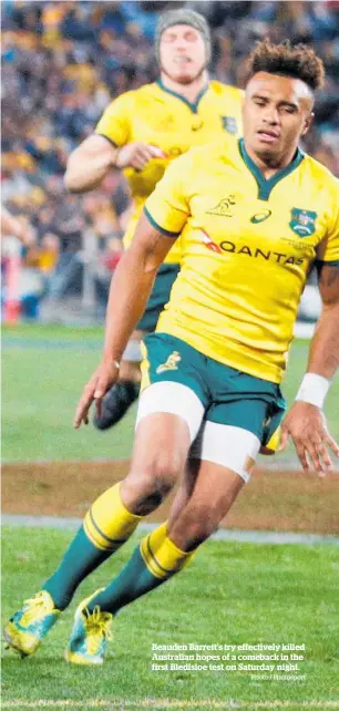  ?? Photo / Photosport ?? Beauden Barrett’s try effectivel­y killed Australian hopes of a comeback in the first Bledisloe test on Saturday night.