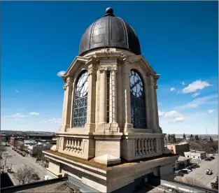  ?? Herald photo by Ian Martens @IMartensHe­rald ?? The Higenbotha­m Building, most well known for its iconic post office clock tower standing above the downtown skyline, is being offered up for sale by the federal government.