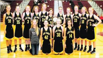  ?? COURTESY PHOTO ?? The Prairie Grove Junior High girls basketball team won the Bi-County Tournament held at Lincoln last week.