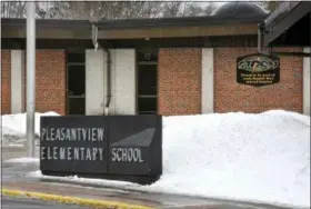  ?? DAVE SCHWARZ — ST. CLOUD TIMES VIA AP ?? A sign marks one of the entrances to Pleasantvi­ew Elementary School on Monday in Sauk Rapids, Minn. Authoritie­s say an 8-year-old student took a kitchen knife to the central Minnesota elementary school and attacked three other children on Monday.