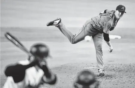  ?? Eric Espada / Getty Images ?? Zack Greinke brings a 2.90 ERA from the Diamondbac­ks and will give the Astros a rotation that includes four of the 13 lowest ERAs among qualified major league starters. He is expected to make his Astros debut on Tuesday at home against the Rockies.