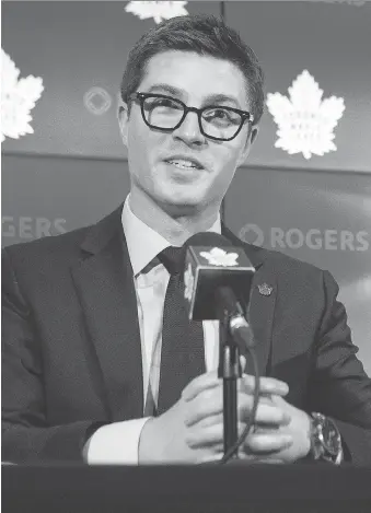  ?? CHRIS YOUNG/THE CANADIAN PRESS ?? Kyle Dubas speaks at a press conference as he’s introduced as the new general manager of the Maple Leafs in Toronto on Friday. The 31-year-old signed a five-year deal with the team.