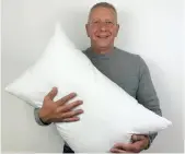  ?? ?? Alexander Miles, inventor of the Gx Pillow pictured with his invention