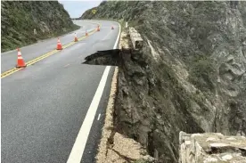  ?? Photograph: AP ?? The Rocky Creek closure on California Highway 1 in Monterey county following heavy rain on Sunday.