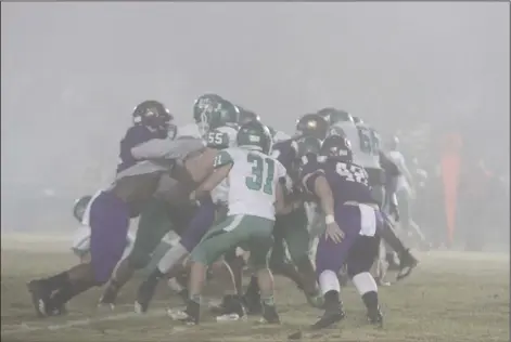  ?? Terrance Armstard/News-Times ?? In the trenches: In this file photo, Junction City and Des Arc collide in the trenches during their showdown in the 2018 2A quarterfin­als at David Carpenter Stadium. Tonight, the Dragons and Eagles meet in the semifinals. Game time is set for 7 p.m.