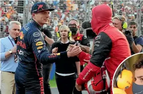  ?? AP ?? Ferrari’s Charles Leclerc, far right, took pole for today’s Australian Grand Prix. Above: Red Bull’s Max Verstappen, left, congratula­tes Leclerc. Aussie Daniel Ricciardo, right, has his McLaren seventh on the grid.