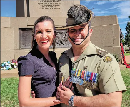  ?? PHOTO: KEN SMITH ?? Former Dubbo Christian School captain Lieutenant Colonel Alvaro 'Al' Charry, with wife Skye, was the guest speaker at this year's Anzac Day ceremonies in the city.