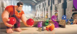  ?? Disney ?? Playing nice: Wreck-It Ralph (voiced by John C. Reilly) offers Pac-Man cherries to out-of-work characters from an unplugged Q*bert game.