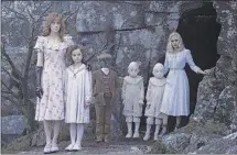  ?? JAY MAIDMENT/20TH CENTURY FOX ?? Lauren Mccrostie (left), Pixie Davies, Cameron King, Thomas and Joseph Odwell and Ella Purnell appear in a scene from, “Miss Peregrine’s Home for Peculiar Children”.