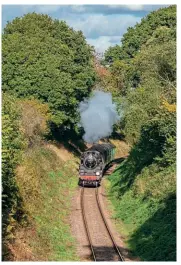  ?? JAMES CORBEN ?? Above: Amid the changing hues of the autumn foliage, BR Standard 4MT 4-6-0 No. 76017 heads towards Medstead & Four Marks.