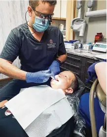  ?? CONTRIBUTE­D ?? The Miami County Dental Clinic provides care for those age 3 and older at its offices in Troy and, for children, through a Traveling Smiles project that visits schools.