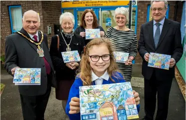  ??  ?? From left: Wokingham Borough Mayor Cllr Rob Stanton and Mayoress Maurren, Helen Powell (Headteache­r, Winnersh Primary School), Zelia Fernandes (winner of the card contest) and Lesley and Alun Hicks