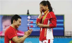  ?? Photograph: Xinhua/Rex/Shuttersto­ck ?? ‘I don’t think many people in their right mind would consider making a public proposal.’ China’s Qin Kai proposes to diver He Zi after she receives a silver medal at Rio 2016.