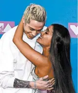  ?? JAMIE MCCARTHY/GETTY 2018 ?? Ariana Grande with Pete Davidson during the pop star’s “summer of fun.”