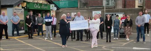  ??  ?? Orla Hore (front, left) and Margaret Brennan (front, right) with the cheque for €1,500 which they presented to the Friends of Arden House.