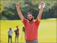  ?? Hector Vivas / Getty Images ?? Jon Rahm celebrates after making a par in the 18th hole to win the Mexico Open on Sunday.