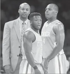  ?? Alex Gallardo Associated Press ?? DENVER Coach Brian Shaw talks with guards Nate Robinson, center, and Randy Foye during an exhibition game against the Lakers. The Nuggets won, 97-88.