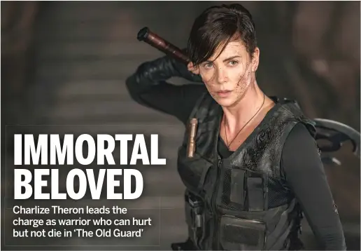 ??  ?? The immortal Andy (Charlize Theron) leads a team of fighters viewed as mercenarie­s in “The Old Guard.”