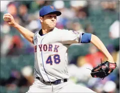  ?? Matthew Stockman / Getty Images ?? Mets starting pitcher Jacob deGrom delivers against the Rockies in the first game of Saturday’s doublehead­er.