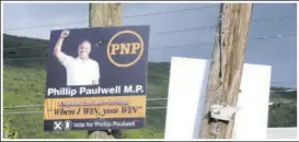  ??  ?? One of Phillip Paulwell’s signs for the September 3 General Election is seen last weekend mounted on a utility pole in his constituen­cy.