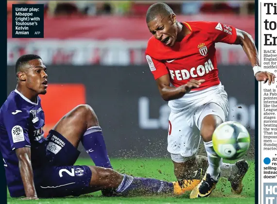  ?? AFP ?? Unfair play: Mbappe (right) with Toulouse’s Kelvin Amian