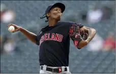  ?? STACY BENGS — THE ASSOCIATED PRESS ?? Indians’ pitcher Triston McKenzie throws against the Twins during the first inning Sept. 14in Minneapoli­s.