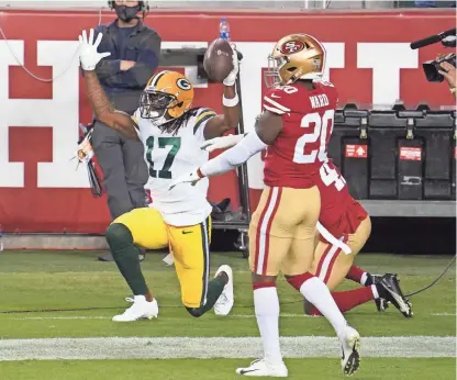  ?? KYLE TERADA / USA TODAY SPORTS ?? Packers receiver Davante Adams celebrates after scoring a touchdown against the 49ers last Thursday night. If the Packers are going to make a deep playoff run, they will have to rely on their offense.