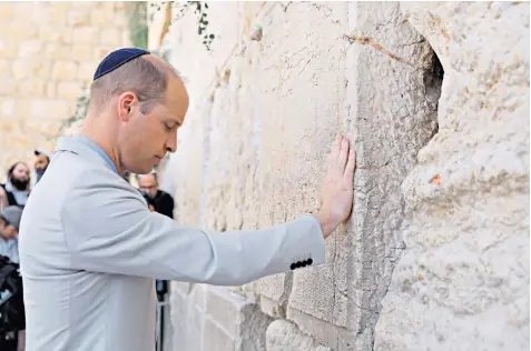  ??  ?? The Duke of Cambridge at the Western Wall; the Church of Holy Sepulchre, top left; the tomb of Princess Alice, below left, at the Church of St Mary Magdalene; and the Al-aqsa mosque, below right