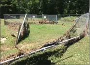  ?? EVAN BRANDT — MEDIANEWS GROUP ?? Fencing in Memorial Park’s dog Bark Park was wiped out by Thursday’s storm.