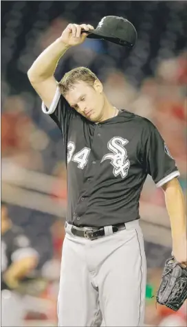  ?? | ROB CARR~GETTY IMAGES ?? White Sox right-hander Gavin Floyd gave up five runs in 51⁄3 innings Wednesday against the Nationals in Washington.