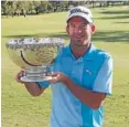 ??  ?? Proud day: Josh Geary shows the spoils from his victory in the West Australian Open.