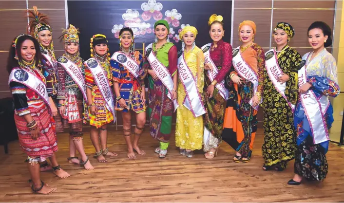  ??  ?? HIYAS SA KADAYAWAN. 11 Hiyas sa Kadayawan candidates pose for a photo during their media presentati­on yesterday at Star Hotel, Mabini Street in Davao City. The candidates' wit are also tested as they are asked questions about culture preservati­on and...