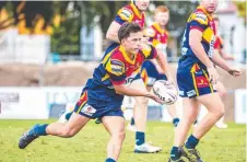  ?? Picture: AAP IMAGE ?? SEASON CANCELLED: Western Mustangs’ Braith Ashurst looks for teammate during his side’s match against Souths Logan. The QRL has cancelled all state league competitio­ns for 2020.