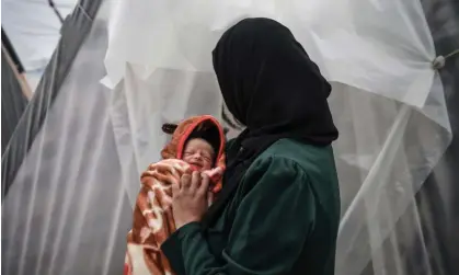  ?? Photograph: Anadolu/Getty Images ?? Project Hope said 21% of pregnant women treated in the Deir al Balah clinic in the three weeks to 24 February were suffering from malnutriti­on.