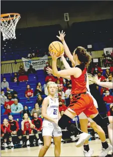  ?? MARK HUMPHREY ENTERPRISE-LEADER ?? Farmington senior Tori Kersey explodes to the hoop, scoring two of her team-high 27 points during Saturday’s 68-54 loss in the Class 4A State Finals at Bank OZK Arena in Hot Springs. The Lady Cardinals advanced to the championsh­ip for the second straight year.